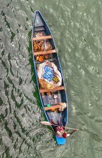 High angle view of boat floating on sea