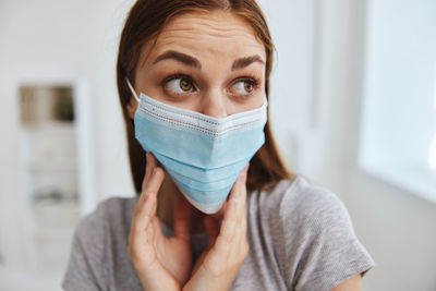 Portrait of woman wearing mask