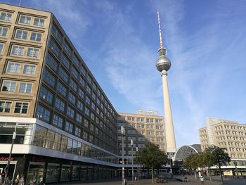 Fernsehturm amidst buildings in city