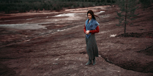 Full length of girl standing on ground