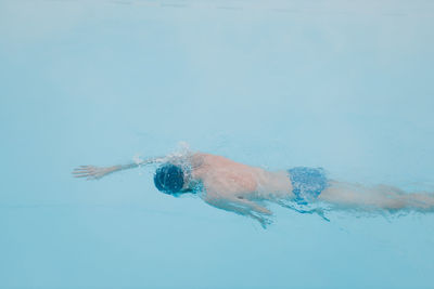 Man swimming in sea