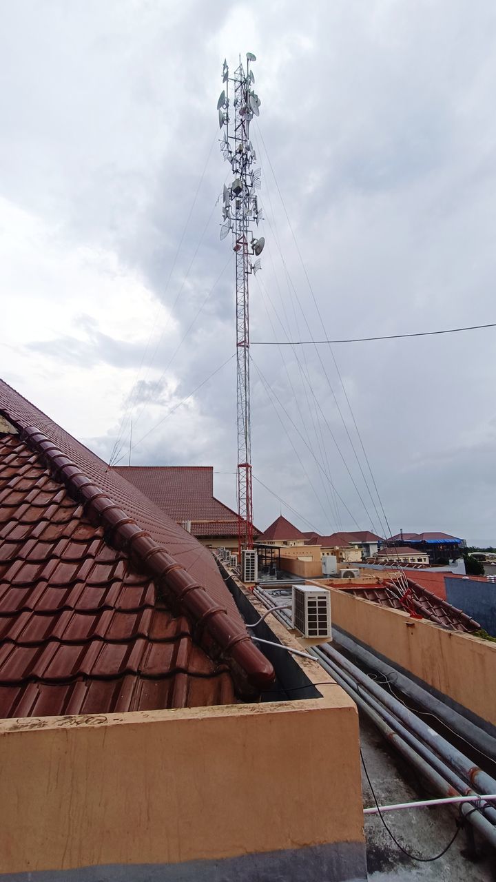 architecture, sky, built structure, cloud, technology, roof, electricity, building exterior, nature, cable, outdoor structure, no people, industry, power generation, day, outdoors, transportation, building, power supply, communication, city