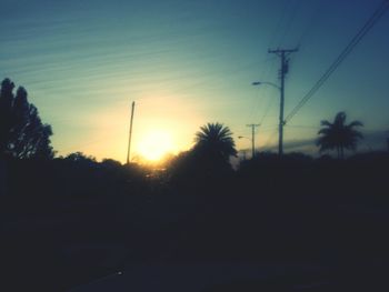 Electricity pylon at sunset