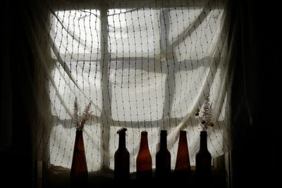 Close-up of curtain against window