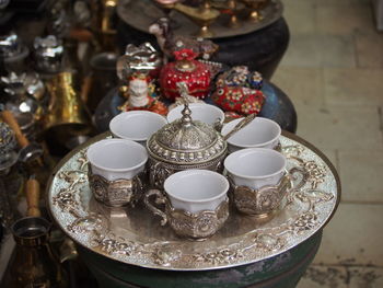 Close-up of crockery in table