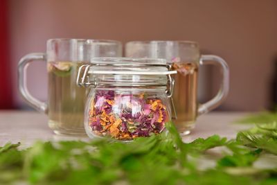 Close-up of glass of jar on table