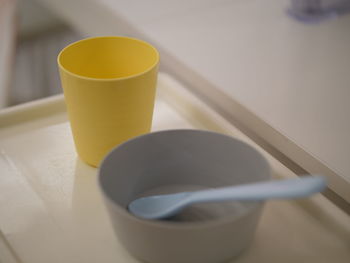 High angle view of coffee cup on table