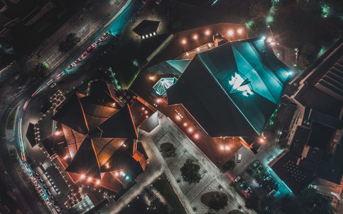 Low angle view of illuminated restaurant at night