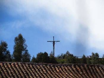 Low angle view of roof and building against sky