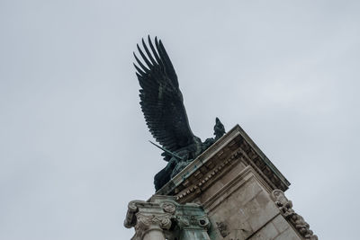 Low angle view of statue against clear sky