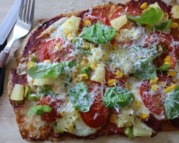 High angle view of pizza in plate on table