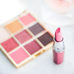 Close-up of lipstick on table