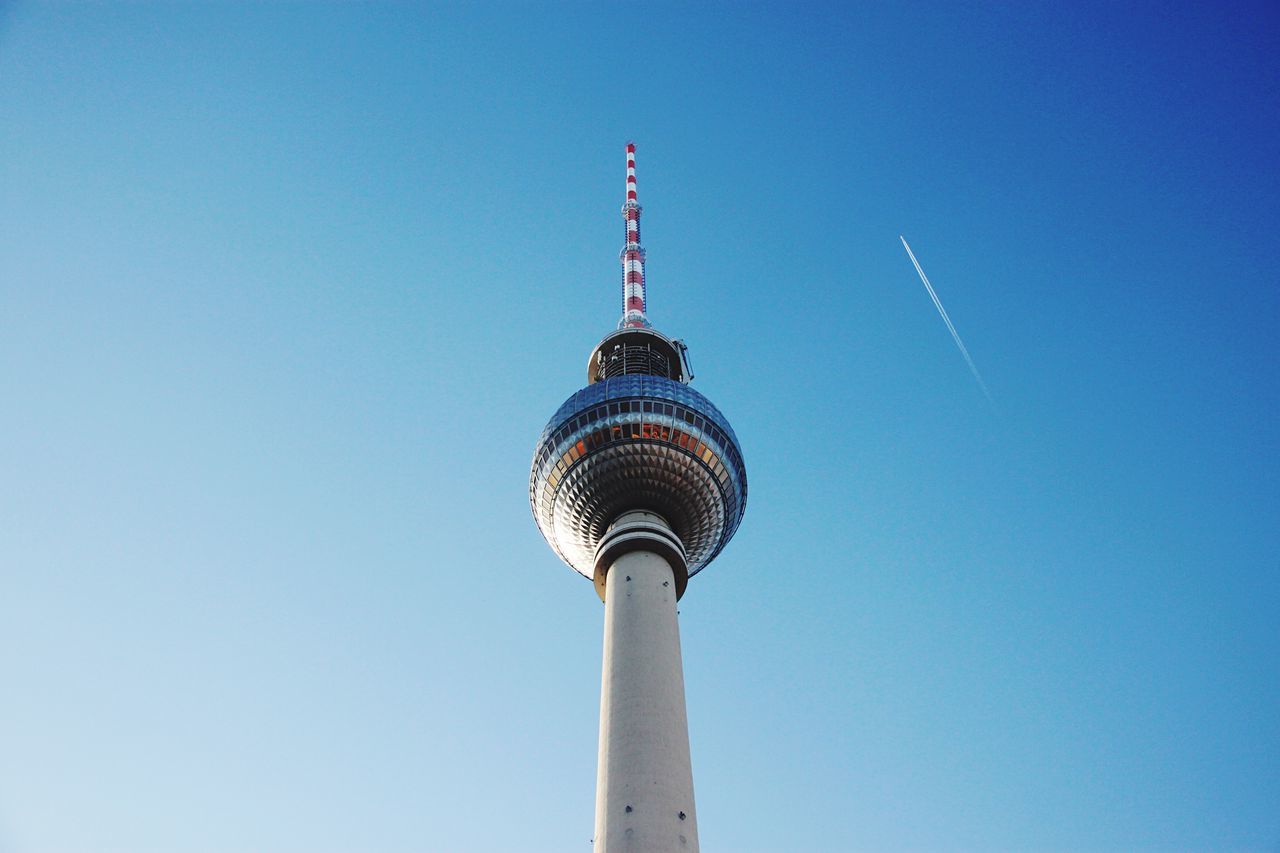 tower, tall - high, communications tower, architecture, built structure, low angle view, international landmark, famous place, capital cities, building exterior, spire, travel destinations, tourism, clear sky, fernsehturm, communication, television tower, travel, culture, skyscraper