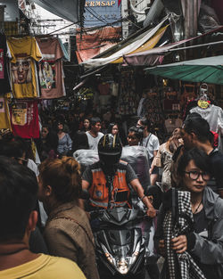 People on street in city at night