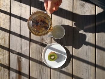 Drinking tea on the balcony.