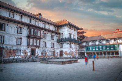 Buildings in city against sky