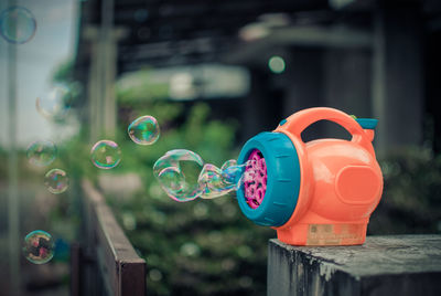 Close-up of bubbles against blurred background