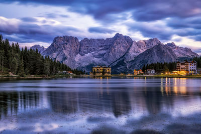 The view of lake misurina and mount sorapiss sunrise view taken during summer. dolomite, italy.