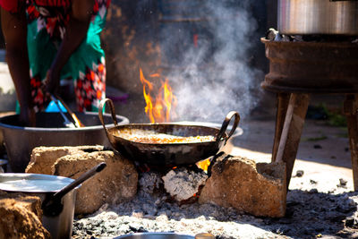 Man preparing food on barbecue grill