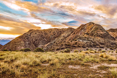 Scenic view of rocky mountains against sky