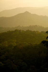 Scenic view of landscape against sky during sunset