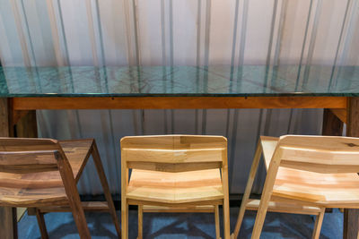 Empty chairs and table in restaurant