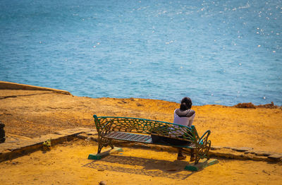 Girl looking at the sea 