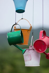 Close-up of multi colored lights hanging on metal