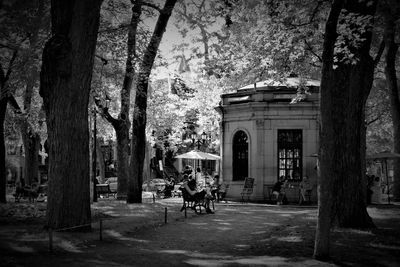 People in front of built structure