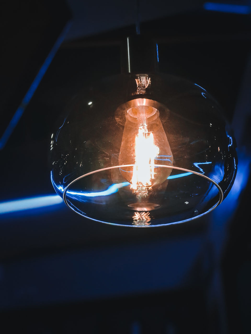 CLOSE-UP OF ILLUMINATED LIGHT BULBS IN GLASS