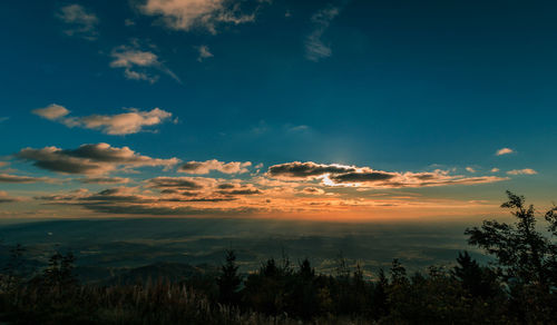 Scenic view of landscape against sky during sunset