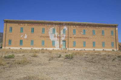 Abandoned built structure against clear sky