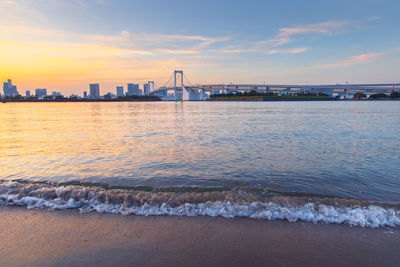 View of suspension bridge over sea