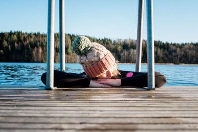 Woman relaxing whilst swimming in cold ice water in sweden in winter