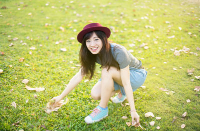 Young woman wearing hat