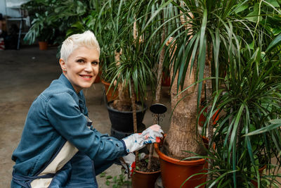 Relaxing home gardening. gardeners hand planting flowers in pot.