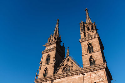 Low angle view of building against blue sky