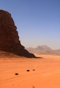 Rock formations in desert against sky