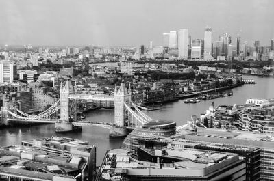 High angle view of river amidst buildings in city