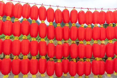 View of lanterns hanging in row outdoors