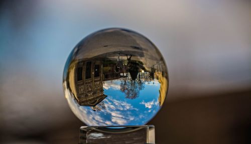 Reflection of buildings in crystal ball