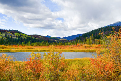 Scenic view of lake against sky during autumn