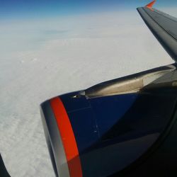 Cropped image of airplane wing