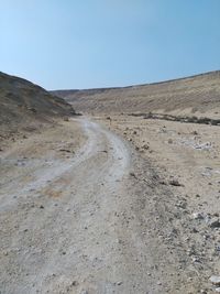 Scenic view of road against clear sky