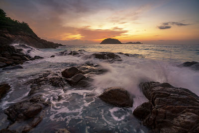 Scenic view of sea against sky during sunset