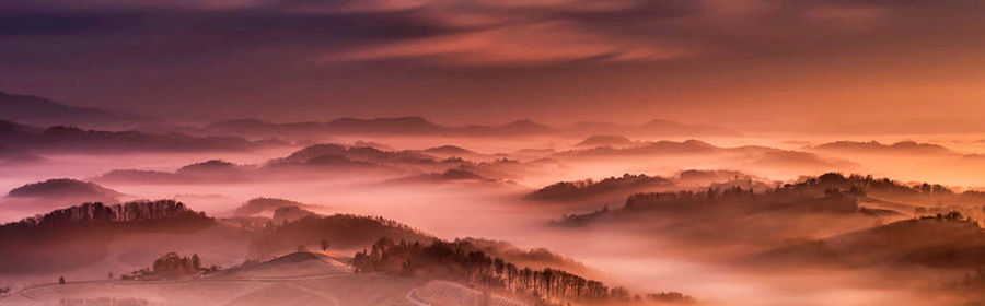 Panoramic view of landscape and mountains against sky