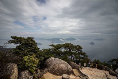 Scenic view of sea against cloudy sky