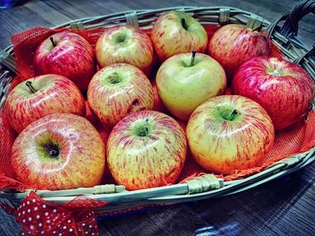 High angle view of apples in basket on table