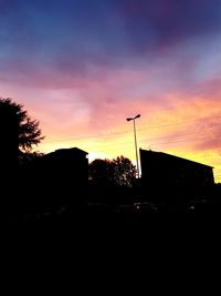 Silhouette of road at sunset