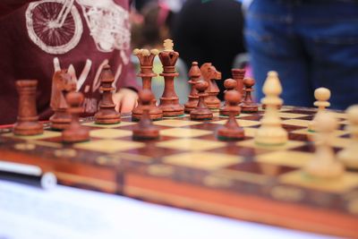 Close-up of chess pieces on board